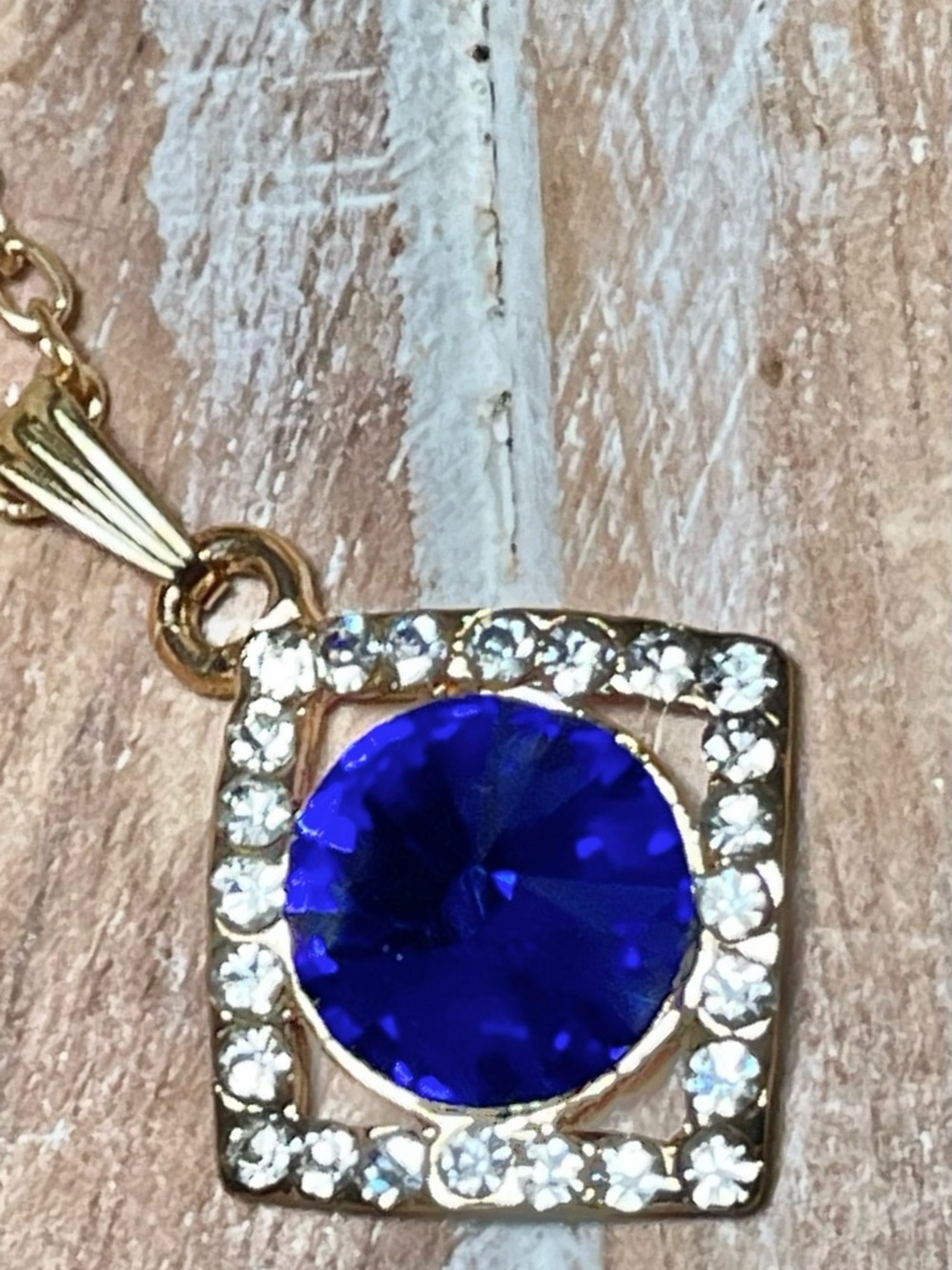 Gold-Tone Necklace with Royal Blue Round Crystal Pendant
